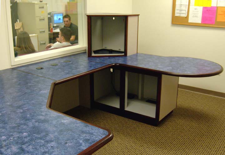 Radio studio furniture — on-air desk and talk table